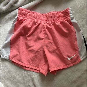 coral colored nike shorts